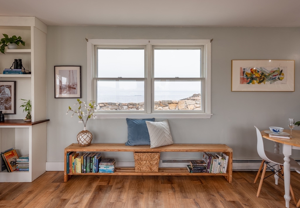 4 N Road, Unit 2 Rockport, MA 01966 - Photo 13 of 21 a living room with a bed furniture and a window