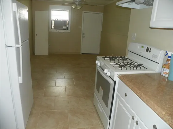 a utility room with washer and dryer
