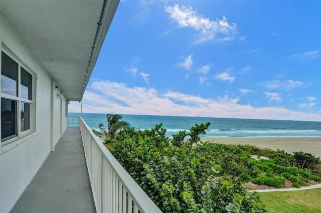 a balcony with view of lake view
