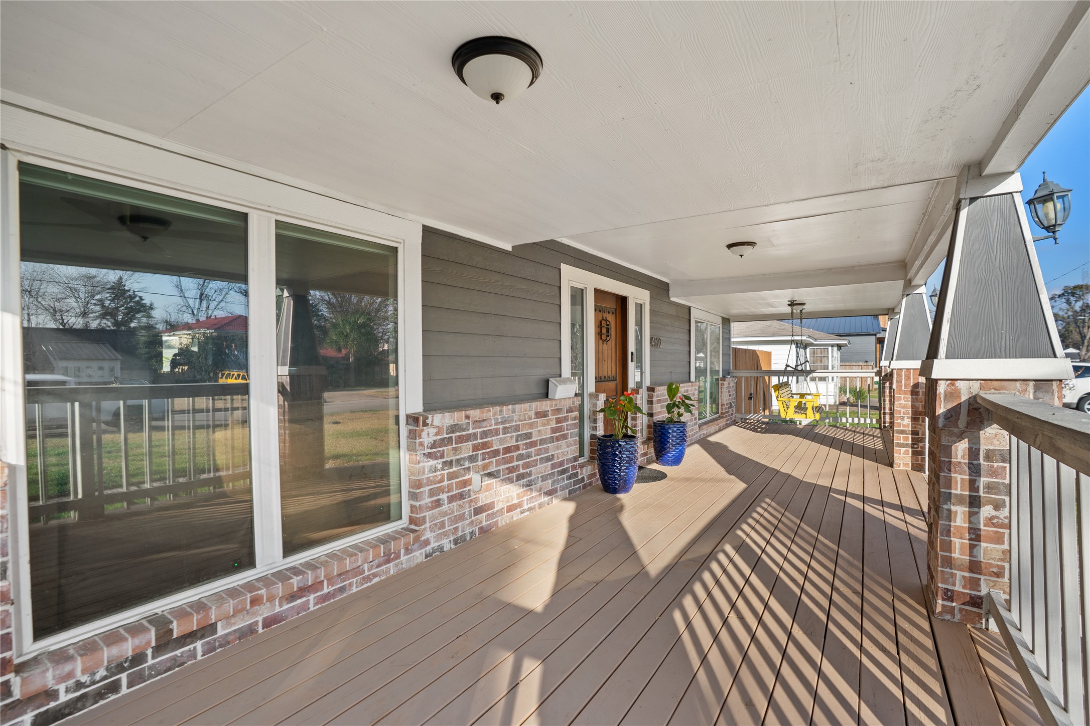 4522 Randwick Drive Houston, TX 77092 - Photo 2 of 31 The full-length front porch adds timeless charm and creates a welcoming space to slow down and enjoy the neighborhood.