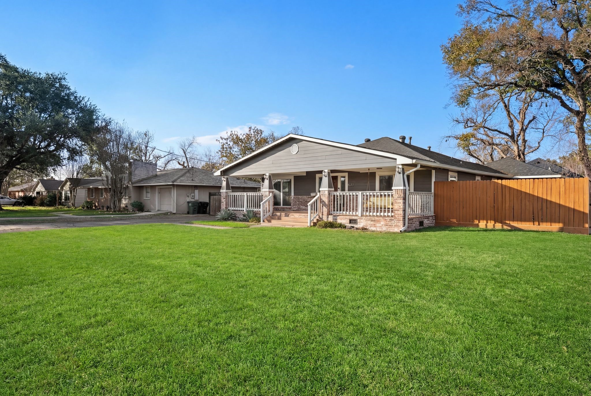 4522 Randwick Drive Houston, TX 77092 - Photo 30 of 32 a front view of a house with a garden