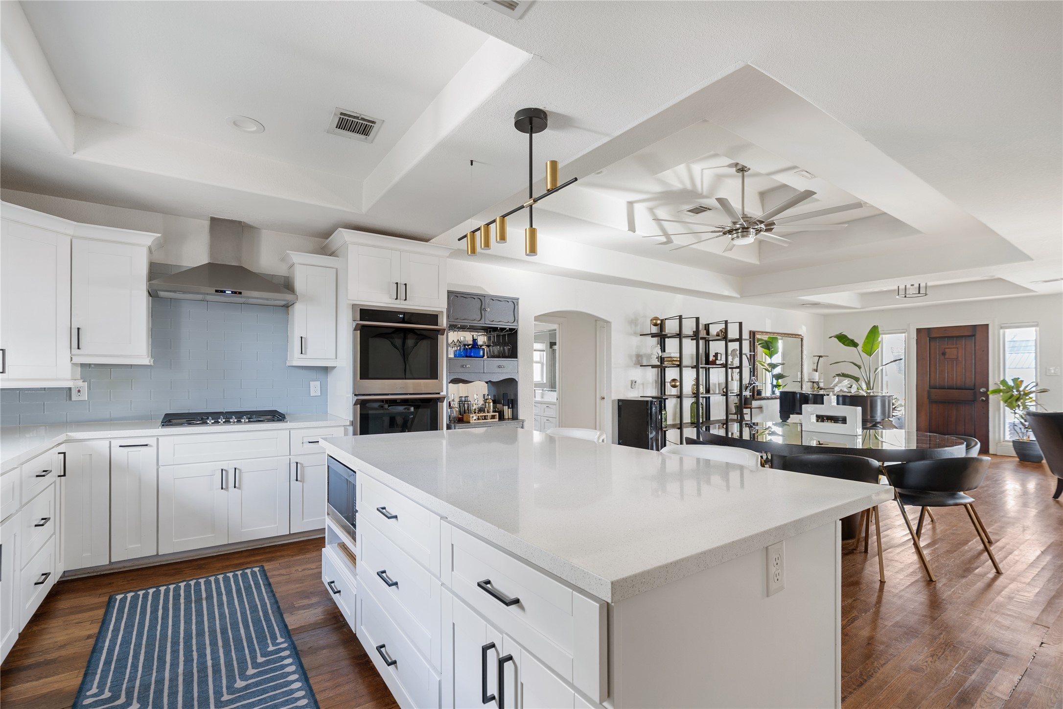 4522 Randwick Drive Houston, TX 77092 - Photo 6 of 31 Shaker-style cabinetry and thoughtfully selected finishes strike a refined balance between everyday function and lasting design.