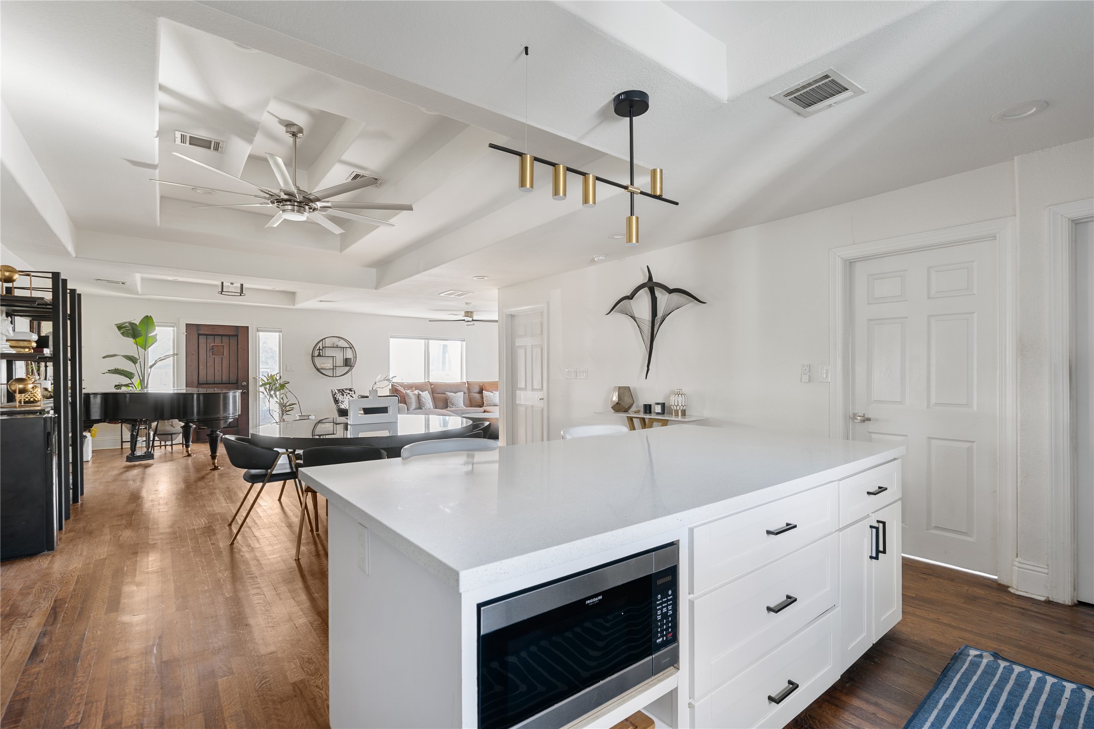 4522 Randwick Drive Houston, TX 77092 - Photo 8 of 31 The seamless flow into the dining and living areas makes entertaining feel easy and natural.
