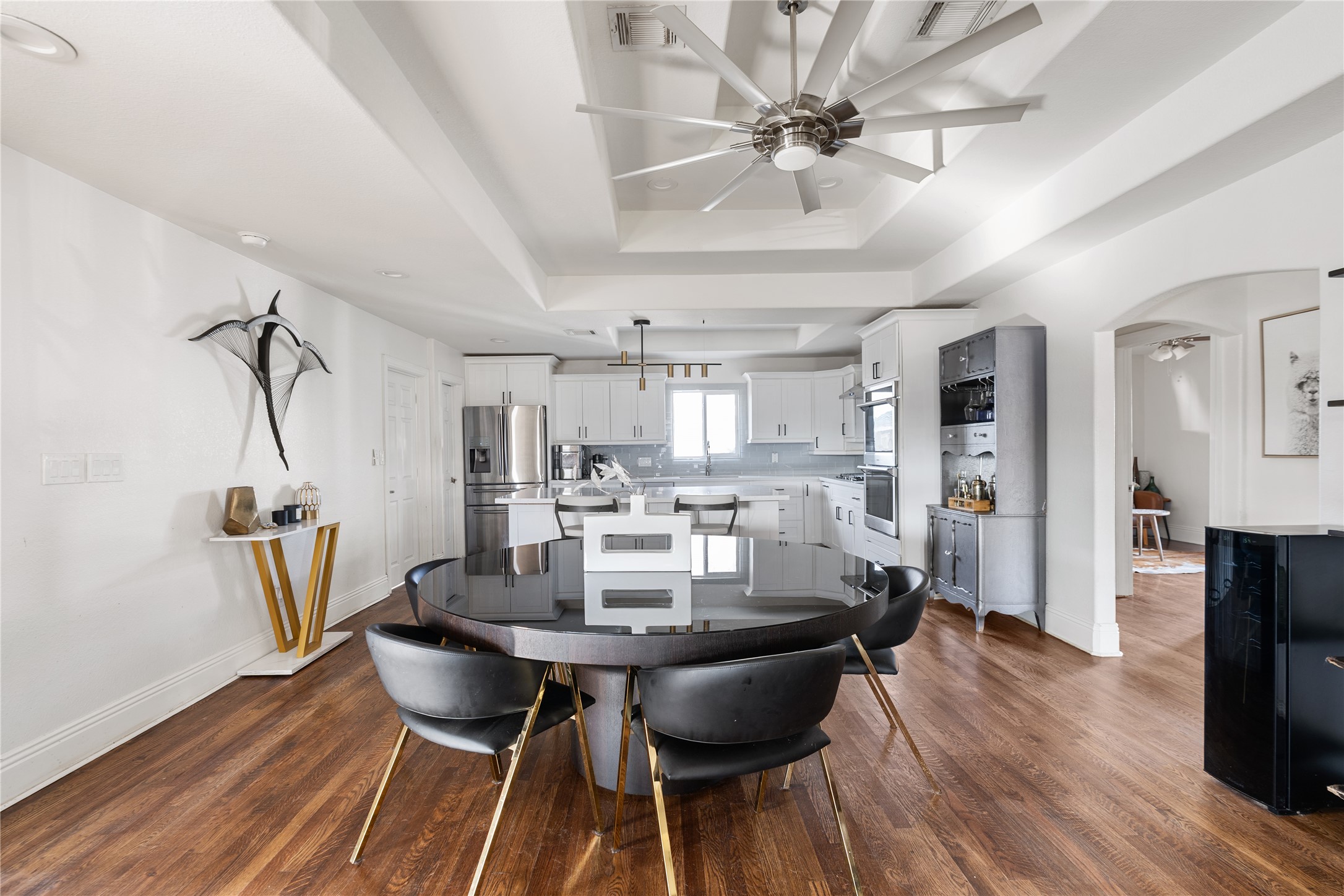 4522 Randwick Drive Houston, TX 77092 - Photo 10 of 31 Open to both the kitchen and family room, the dining area feels connected while still offering a distinct space for gathering.