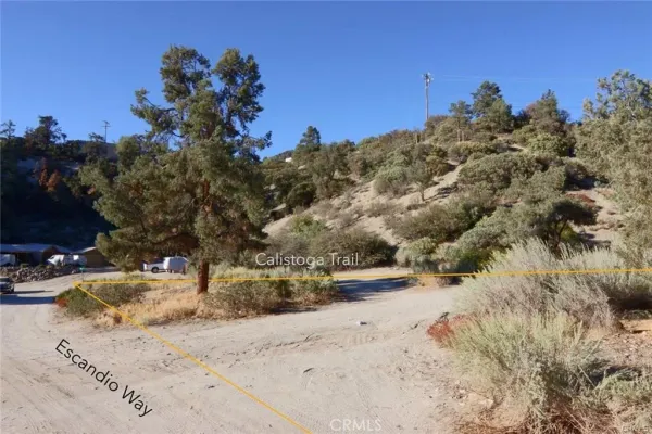 a view of swimming pool with sitting area