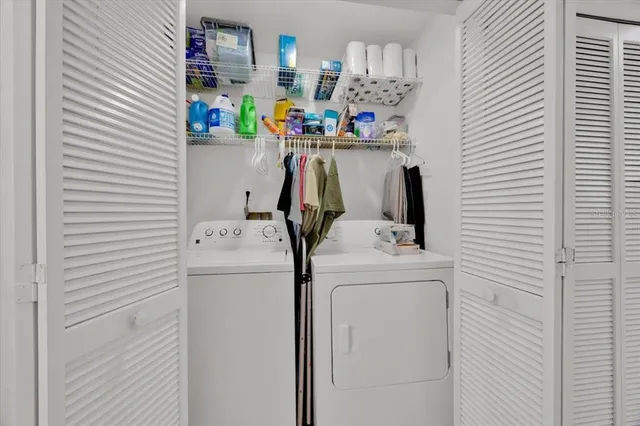 a utility room with dryer and washer