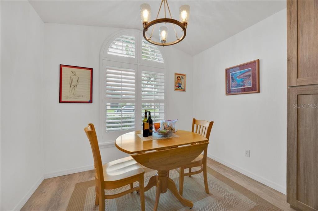 5734 Delano Lane Orlando, FL 32821 - Photo 9 of 28 a dining room with furniture and window