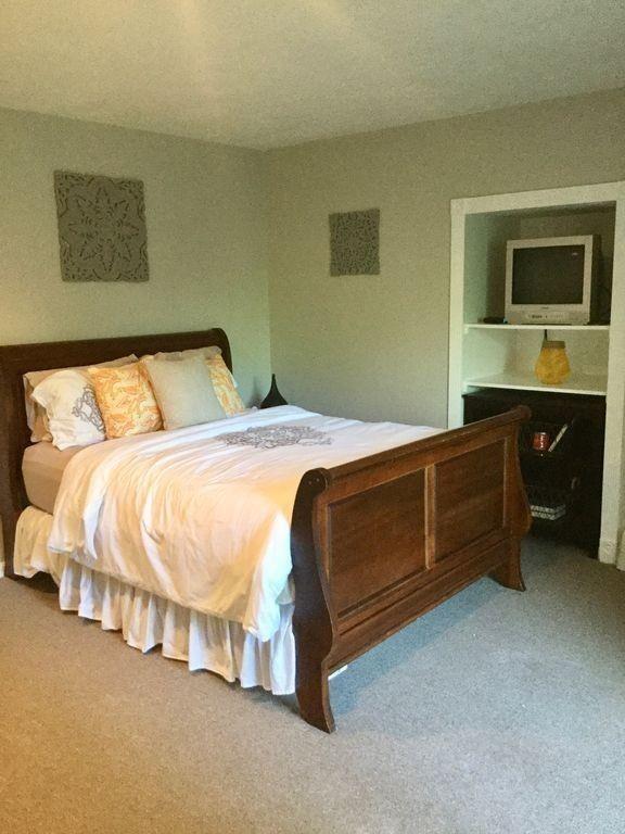 171 County Road Bourne, MA 02532 - Photo 26 of 27 a bedroom with a bed and a flat screen tv