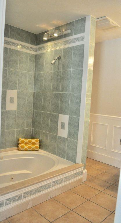 171 County Road Bourne, MA 02532 - Photo 9 of 27 a bathroom with a shower and a bathtub