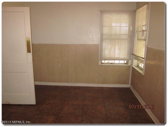 415 Duray Street Jacksonville, FL 32208 - Photo 12 of 25 a view of an empty room with a window
