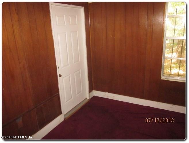 415 Duray Street Jacksonville, FL 32208 - Photo 14 of 25 a view of an empty room and a window