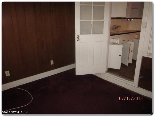 415 Duray Street Jacksonville, FL 32208 - Photo 15 of 25 a view of a closet area with an empty space