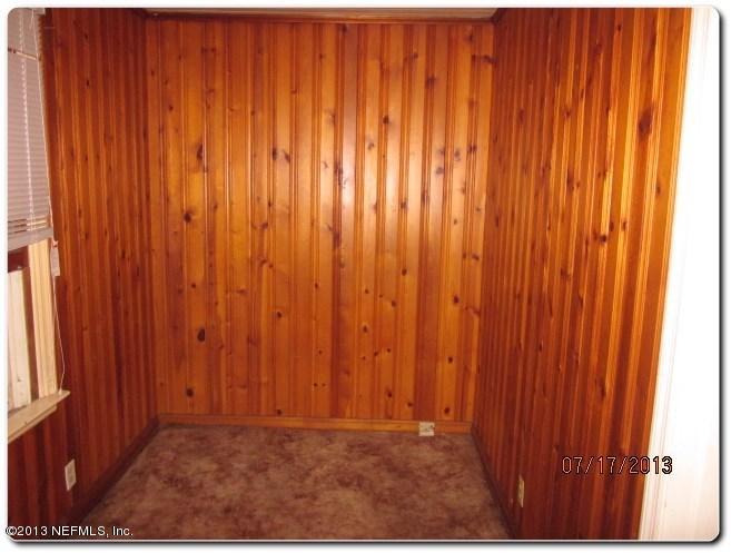 415 Duray Street Jacksonville, FL 32208 - Photo 18 of 25 a view of wooden door