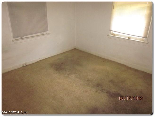 415 Duray Street Jacksonville, FL 32208 - Photo 24 of 25 a view of a small space with wooden floor and a window