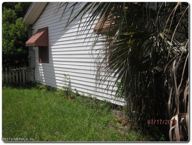 415 Duray Street Jacksonville, FL 32208 - Photo 5 of 25 a view of a house with a backyard