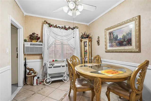 a kitchen with stainless steel appliances granite countertop a refrigerator and a stove