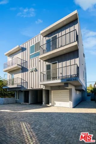a front view of a house with a balcony