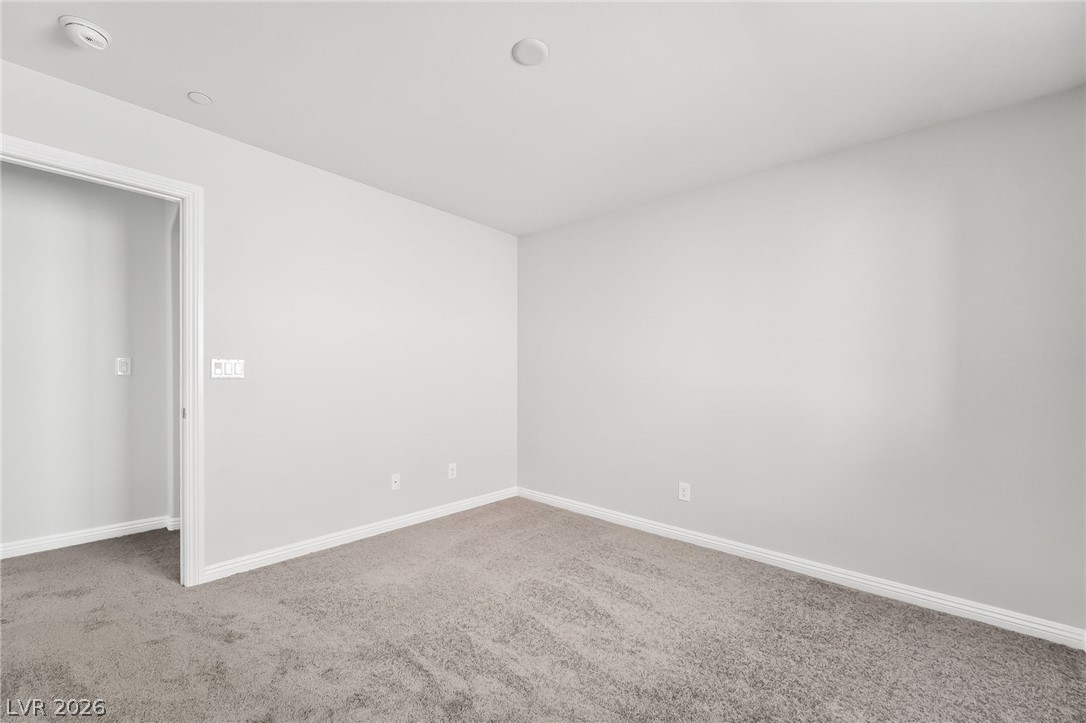 33 Jasmine Point Street Henderson, NV 89074 - Photo 23 of 36 Unfurnished room with carpet floors