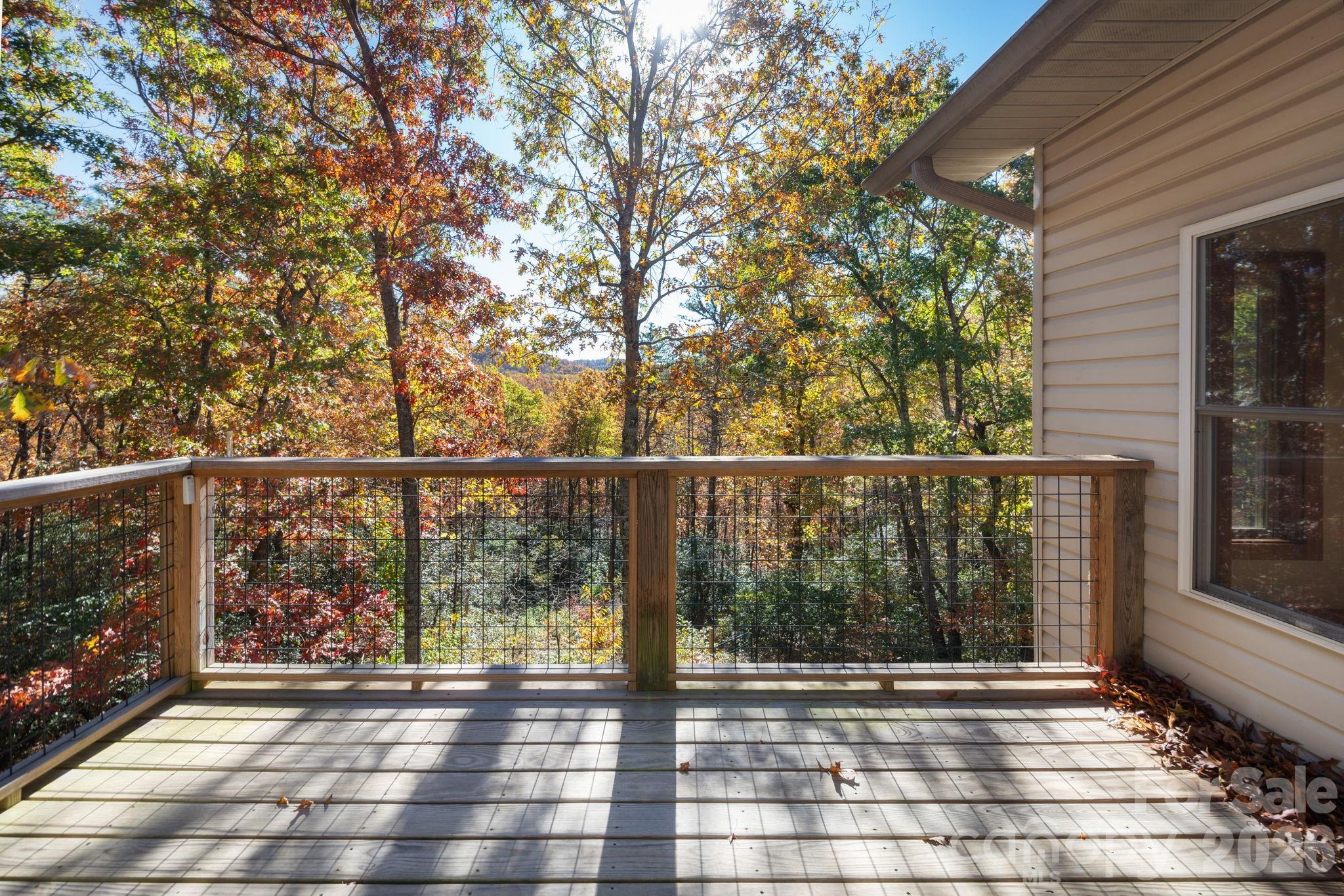 22 Faholoa Ridge Road Black Mountain, NC 28711 - Photo 22 of 47 a view of a balcony with wooden floor