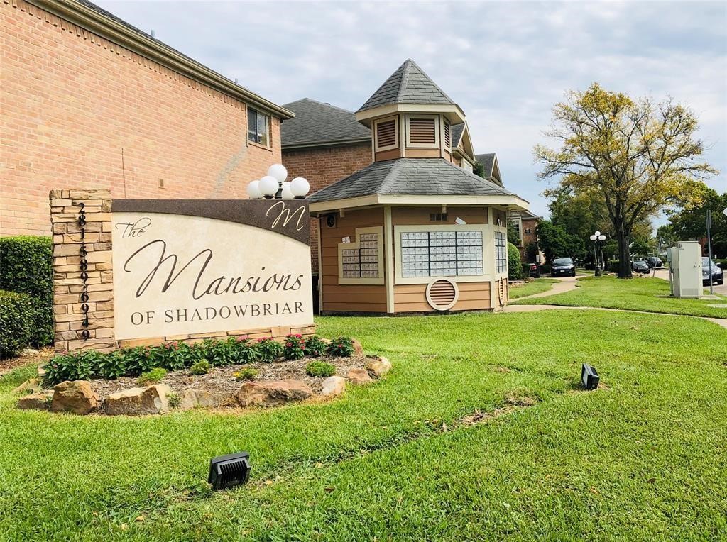 12100 Overbrook Lane, Unit 17D Houston, TX 77077 - Photo 22 of 22 a front view of a house with a yard