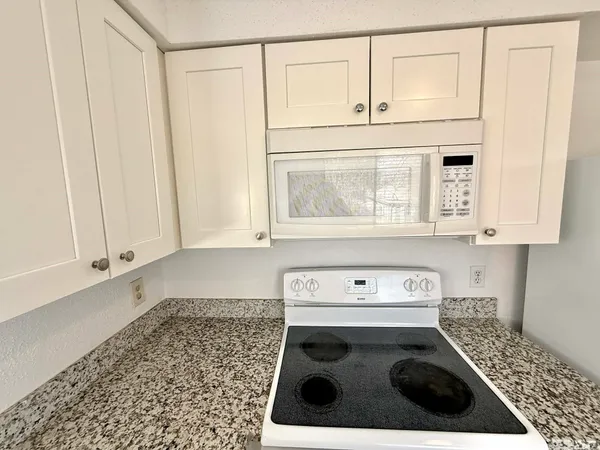 a utility room with washer and dryer