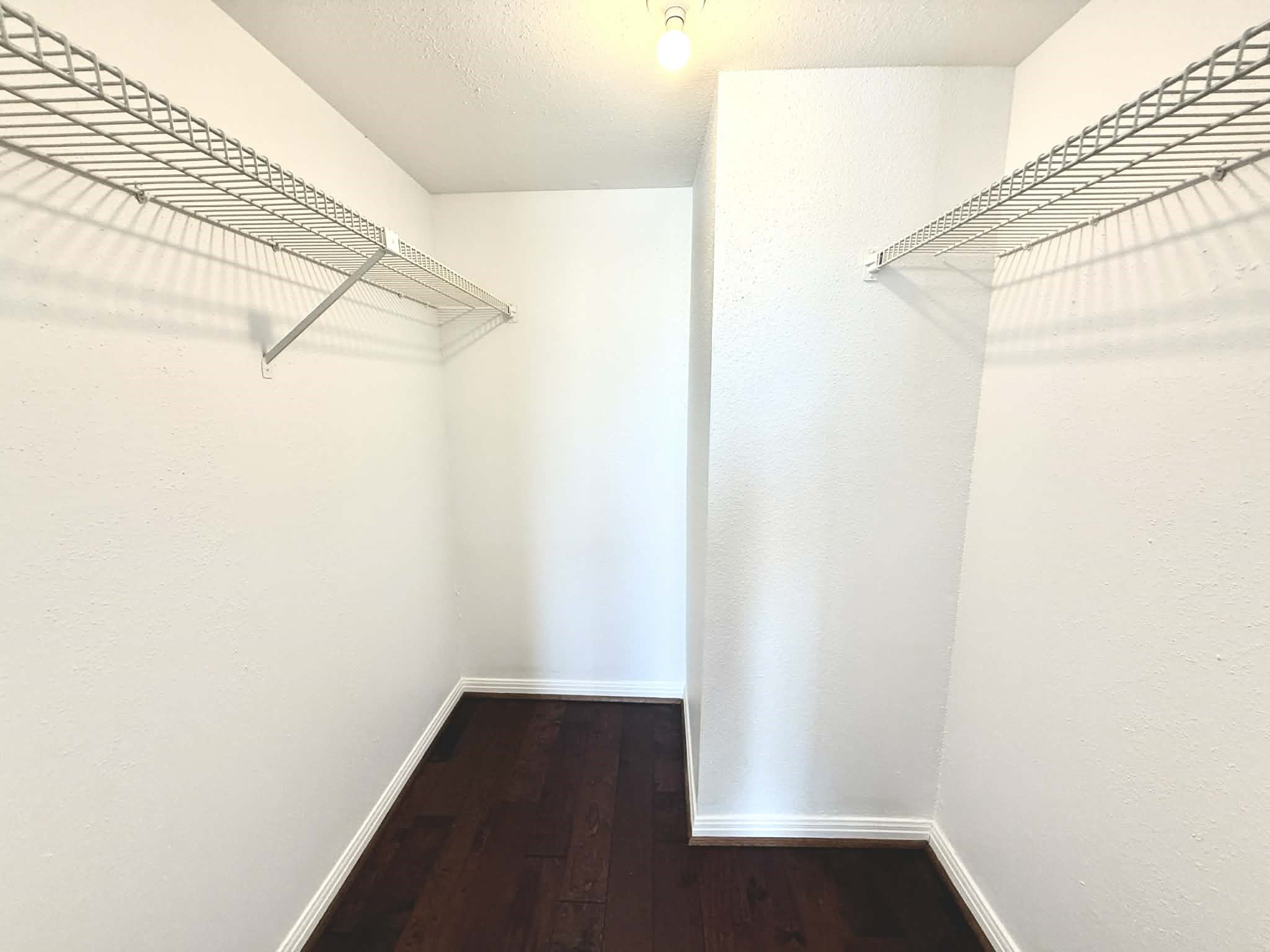 12100 Overbrook Lane, Unit 17D Houston, TX 77077 - Photo 10 of 22 a view of a small space with wooden floor