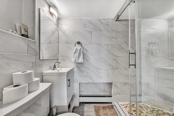 a bathroom with a sink and mirror