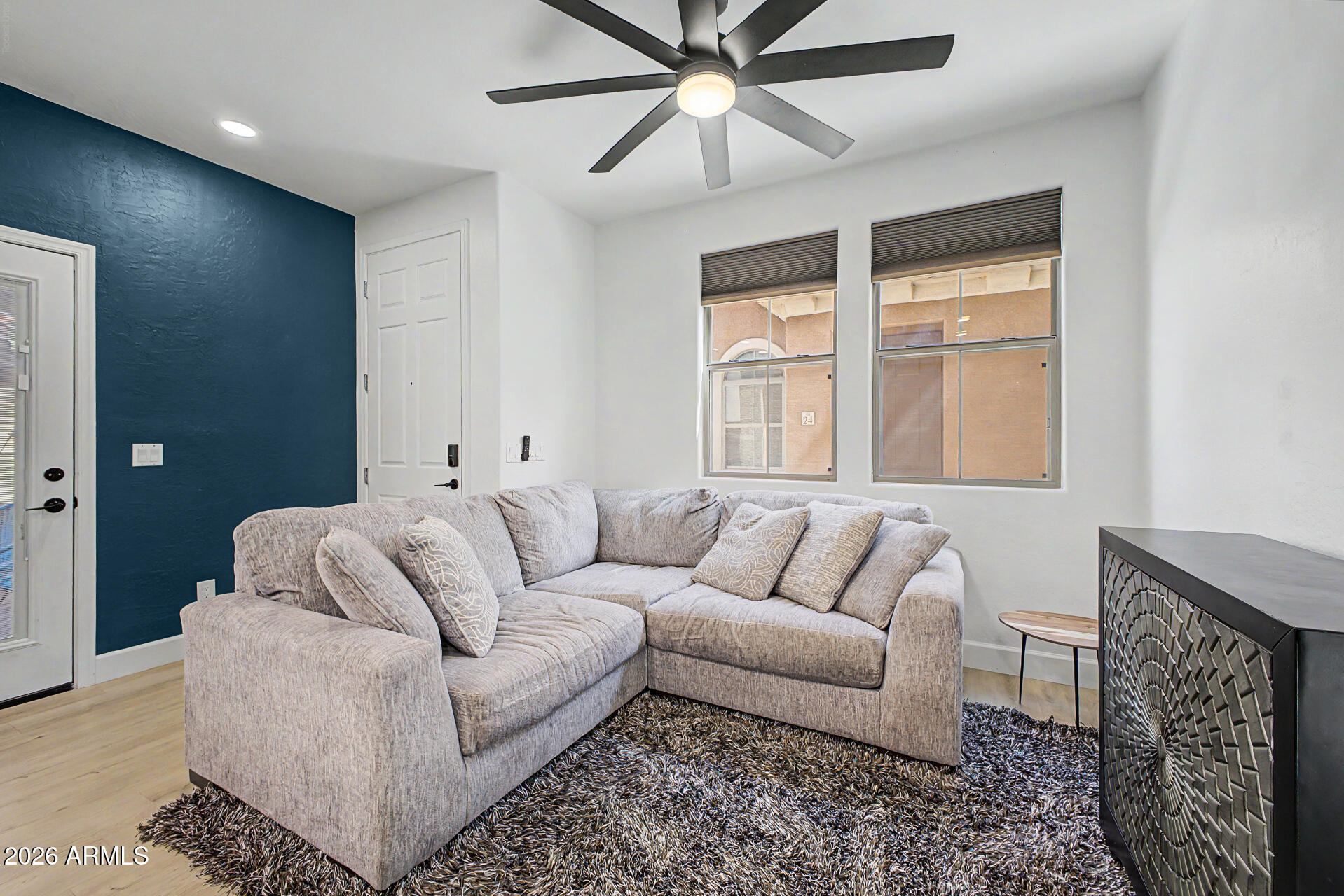 451 South Hawes Road, Unit 27 Mesa, AZ 85208 - Photo 4 of 27 a living room with furniture and a window