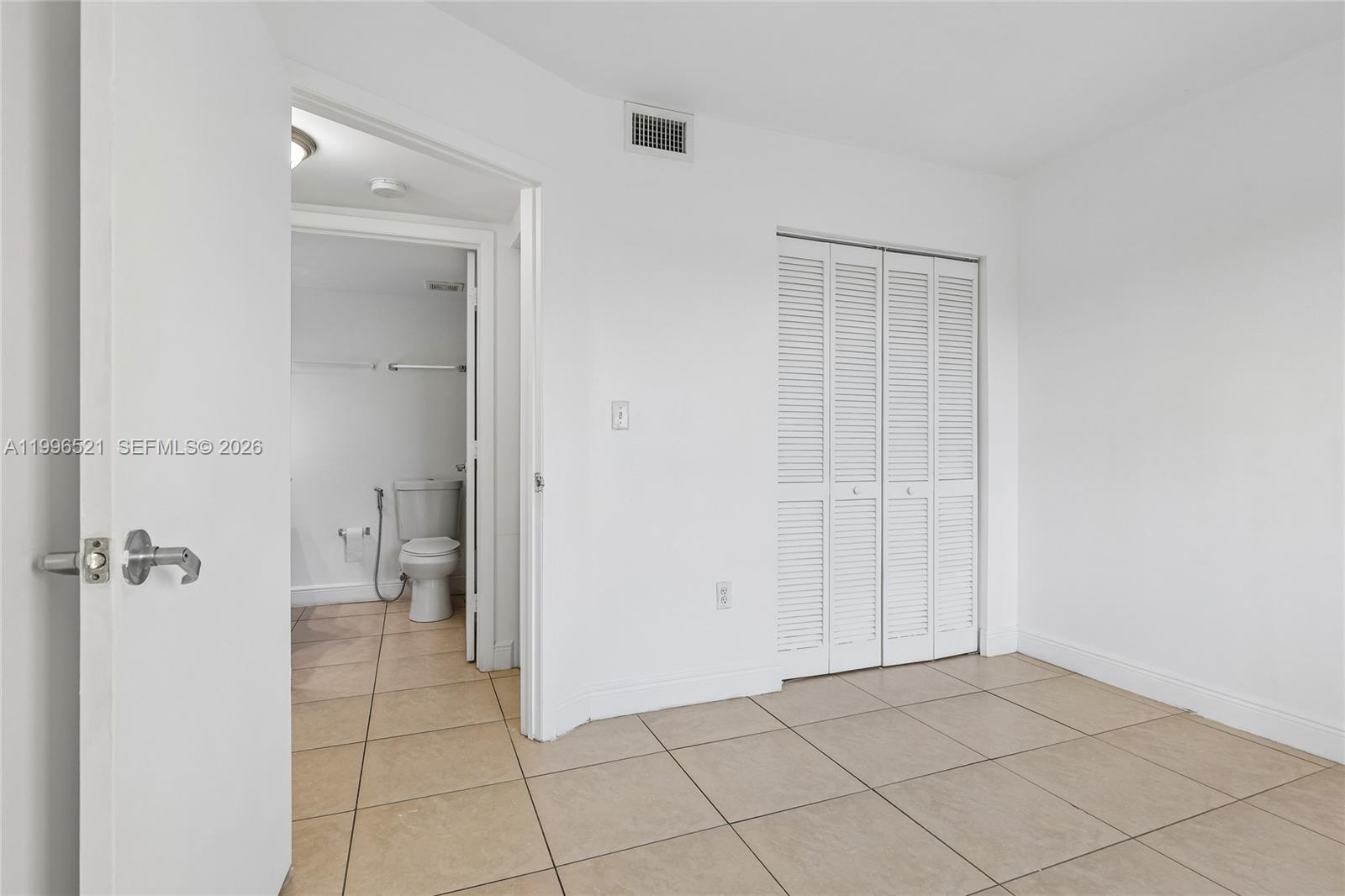 4137 Stirling Road, Unit 507 Dania Beach, FL 33314 - Photo 16 of 20 an empty room with a bathroom