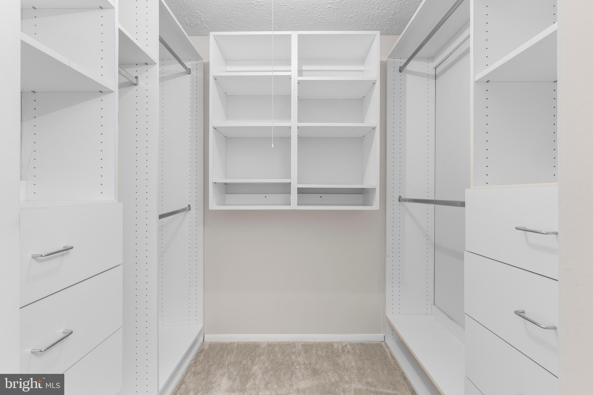 9998 Tuscarora Road Randallstown, MD 21133 - Photo 14 of 21 a view of walk in closet with empty racks