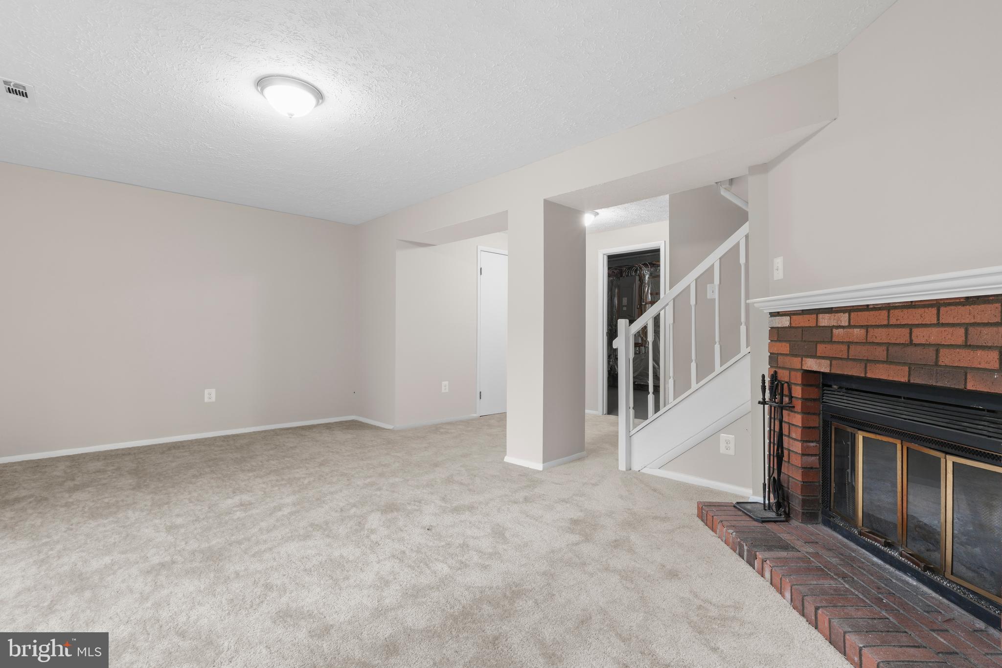 9998 Tuscarora Road Randallstown, MD 21133 - Photo 18 of 21 a view of an empty room with fireplace