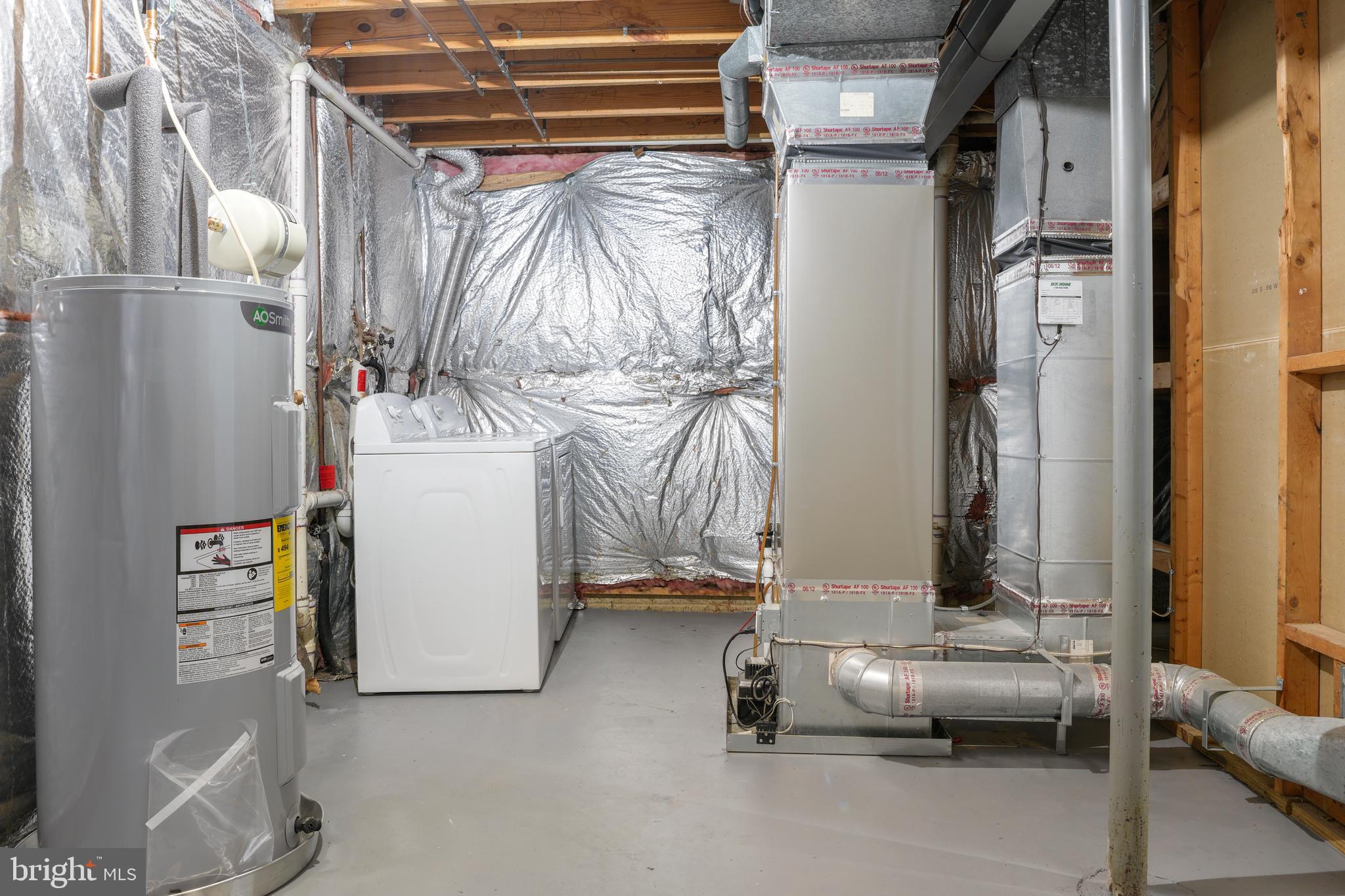 9998 Tuscarora Road Randallstown, MD 21133 - Photo 19 of 21 a view of walk in closet with clothes and shoes
