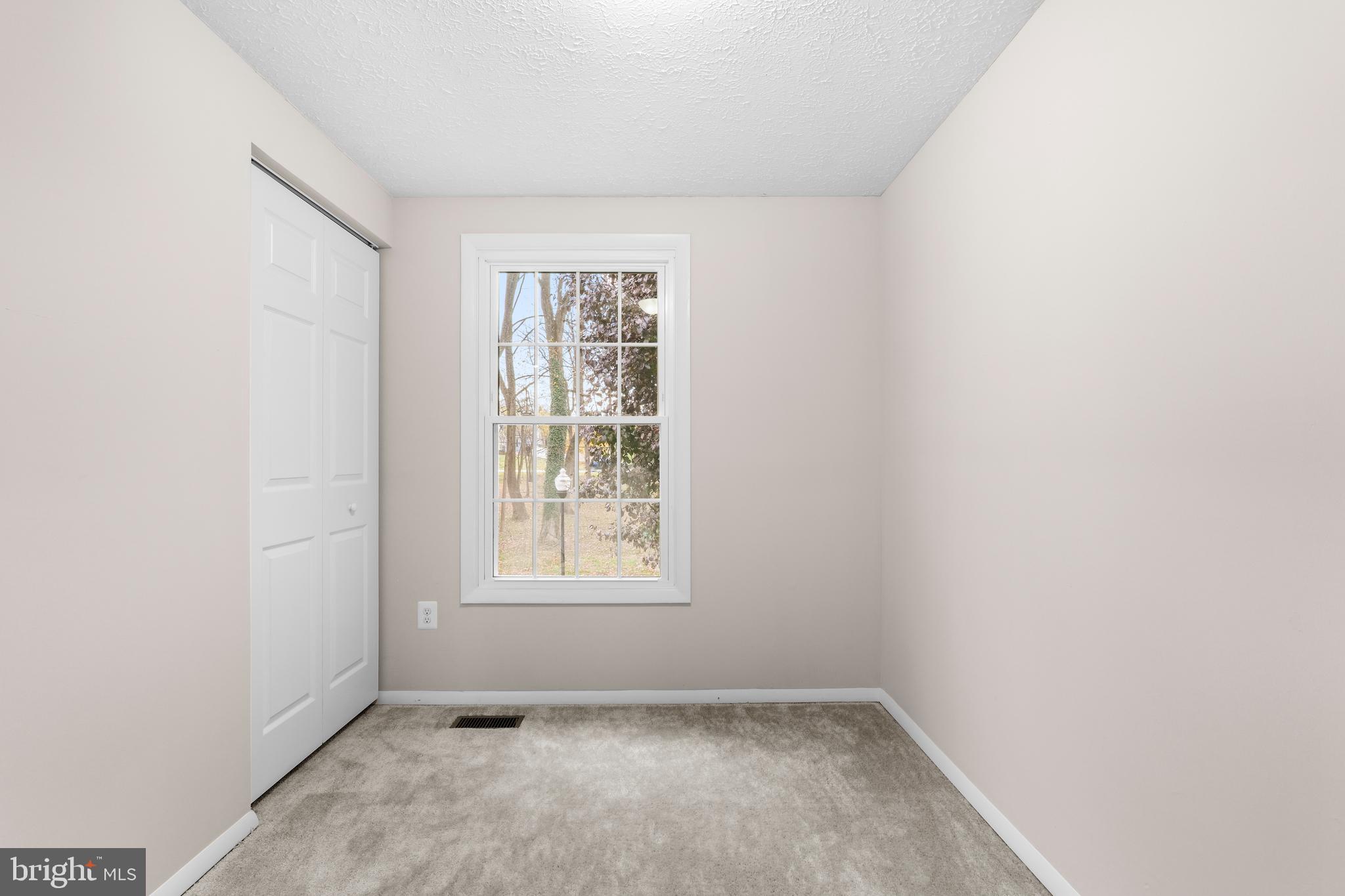 9998 Tuscarora Road Randallstown, MD 21133 - Photo 10 of 21 an empty room with windows