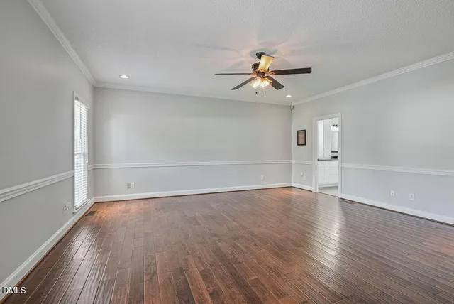 a bathroom with a double vanity sink a mirror and a bathtub