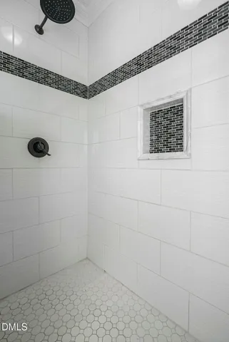 a room with stairs and a wooden floor