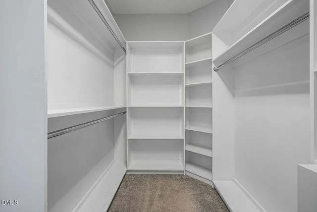 a front view of house with yard and outdoor seating