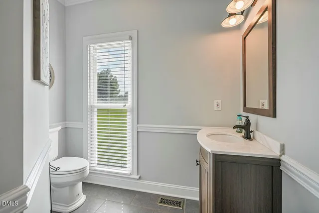 a view of backyard with deck and wooden floor