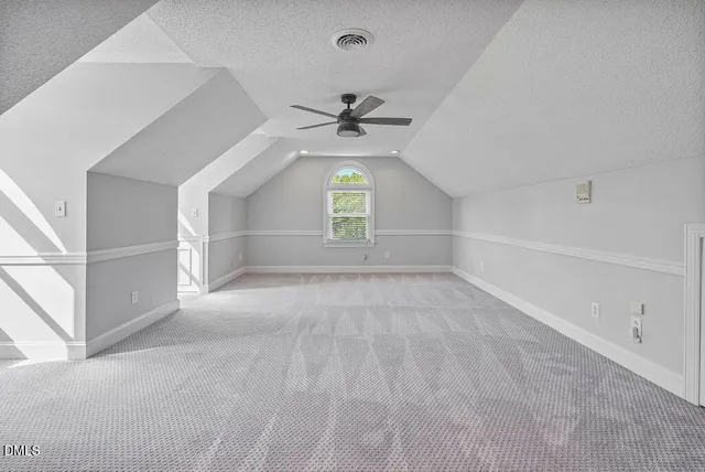 an aerial view of a house with outdoor space and street view