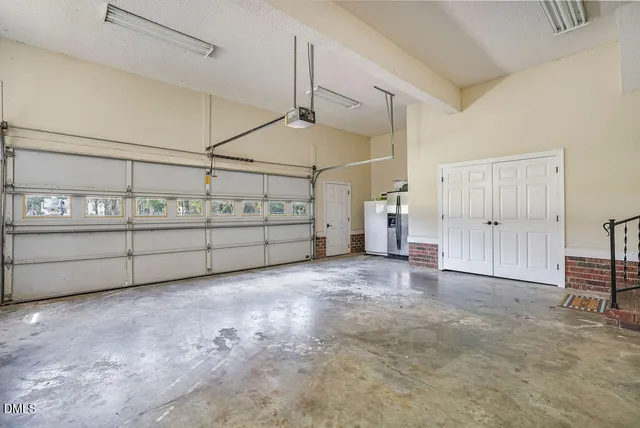 a kitchen with a sink and a microwave