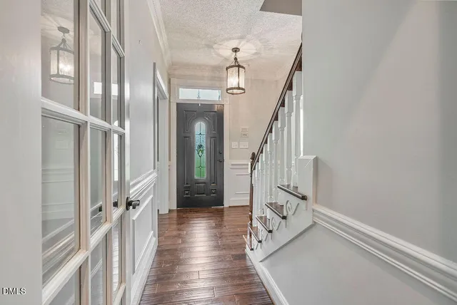a stove top oven sitting inside of a kitchen