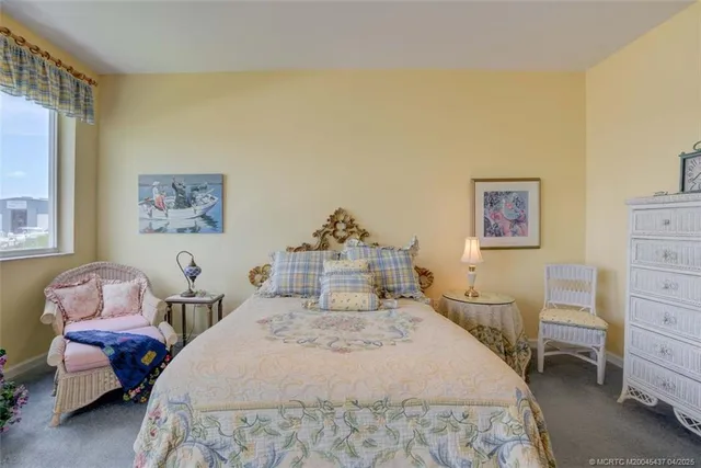 a bedroom with a bed and furniture