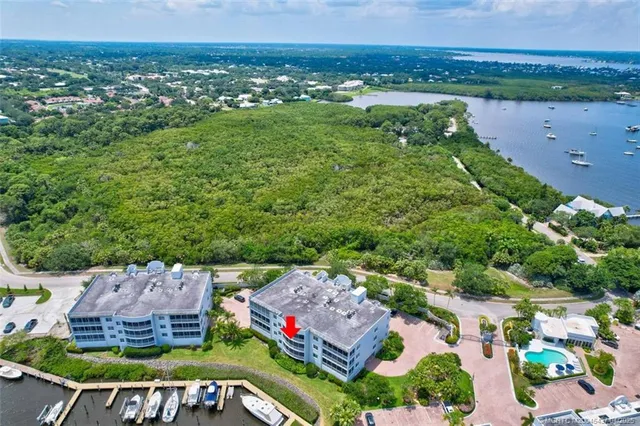 an aerial view of a house with a garden