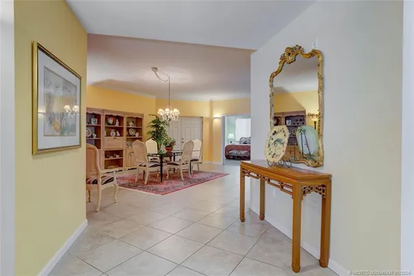 a view of a room with chairs and workspace