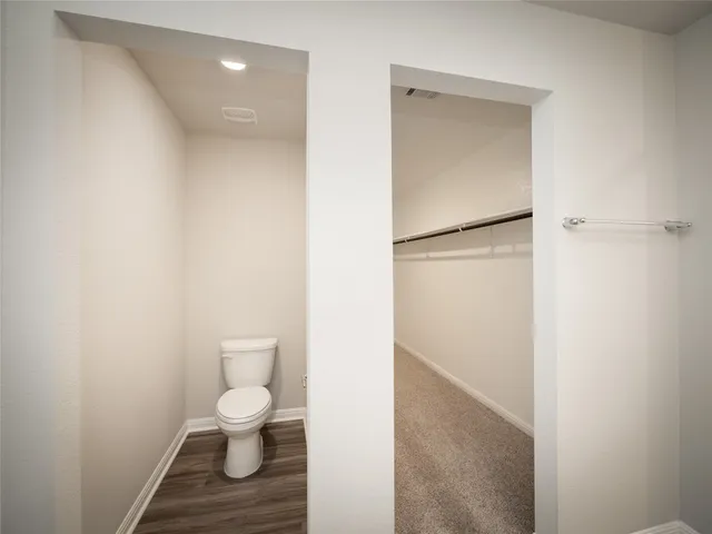 a bathroom with a toilet