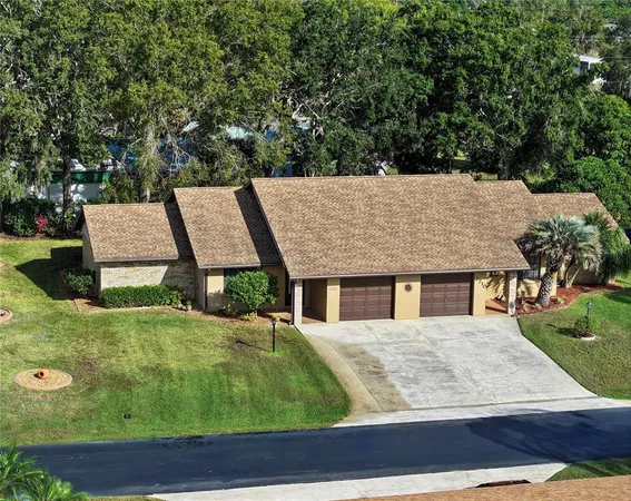 a view of house with yard