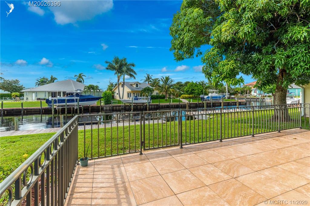 1239 Southwest Dyer Point Road Palm City, FL 34990 - Photo 27 of 34 a view of a wrought iron fences
