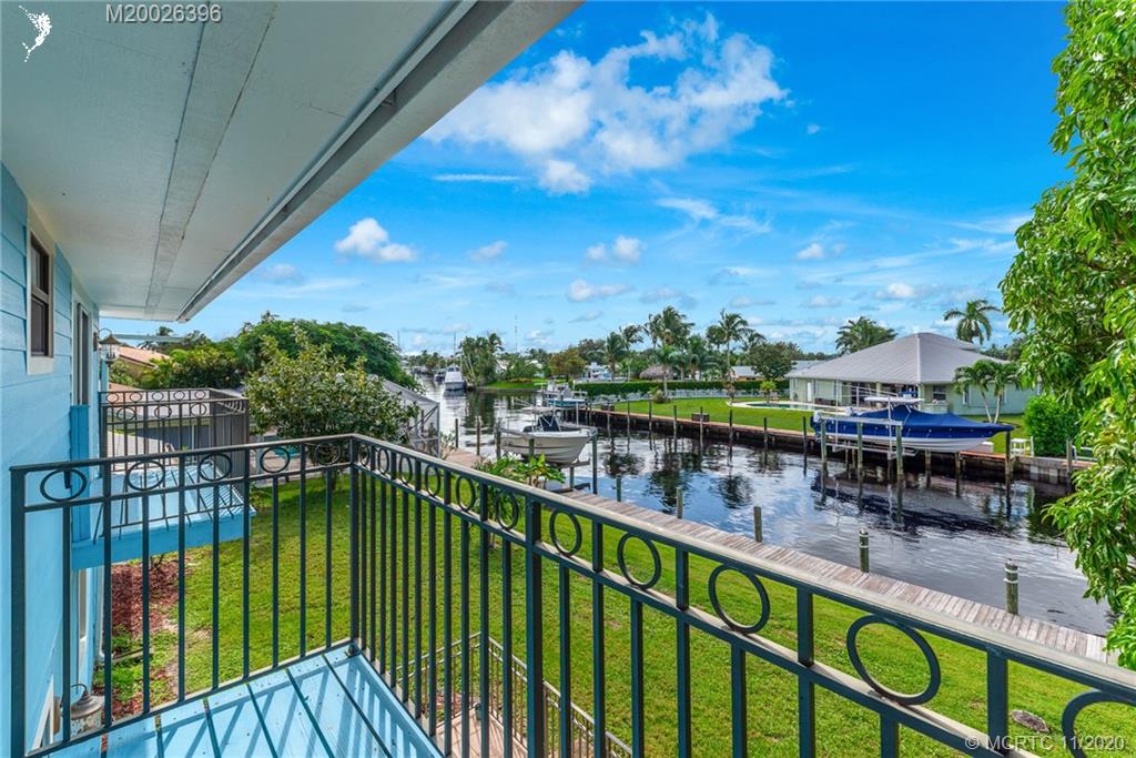 1239 Southwest Dyer Point Road Palm City, FL 34990 - Photo 28 of 34 a view of a balcony with city view