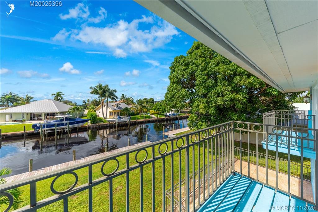 1239 Southwest Dyer Point Road Palm City, FL 34990 - Photo 6 of 34 a view of balcony with furniture