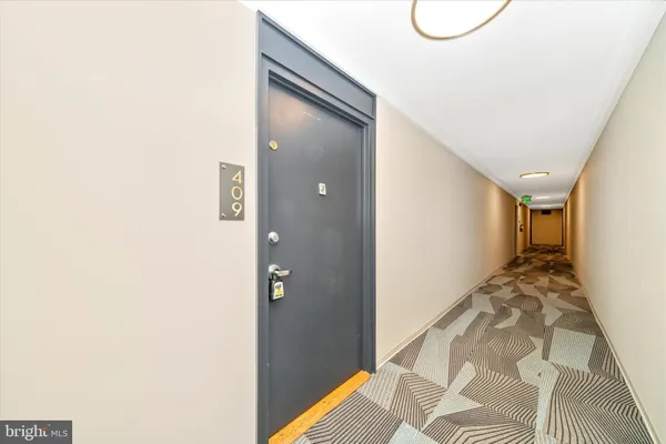 a view of hallway with stairs