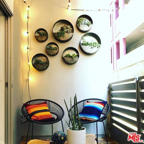 a view of a bench in kitchen and a table